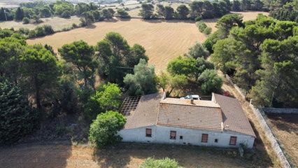 Terreno e 2 caseggiati a testa dell'acqua