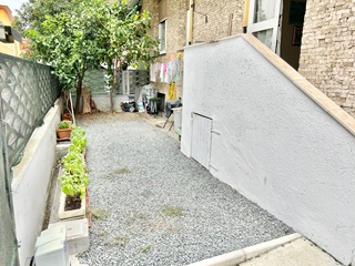 Appartamento con giardino e due posti auto
